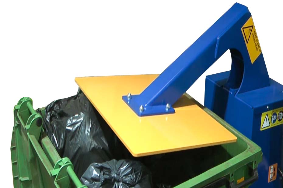 compacting general waste into a waste container.