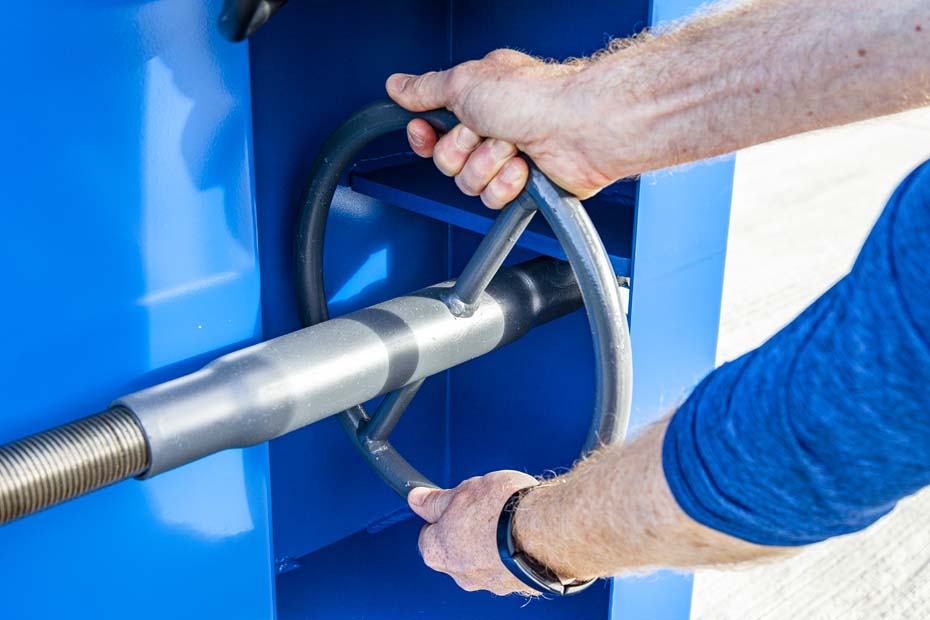 the 650 baler handle release wheel to open the bottom door.