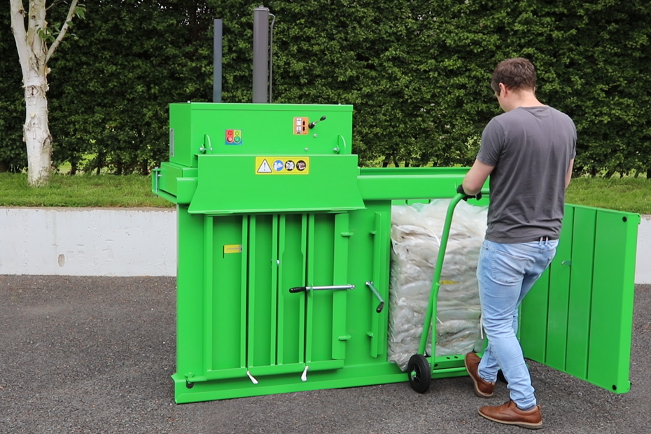 using a bale trolley to eject a plastic bale.